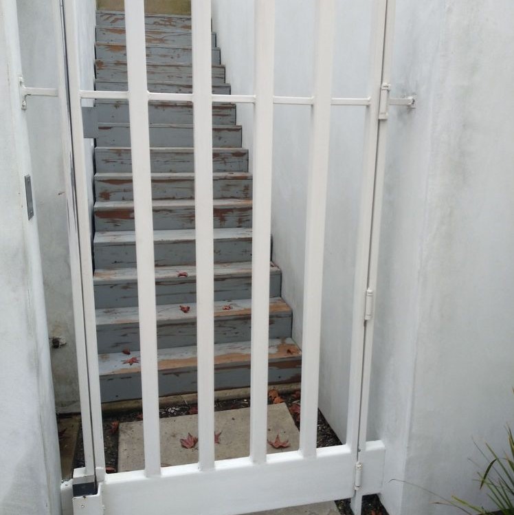 white painted custom iron gate