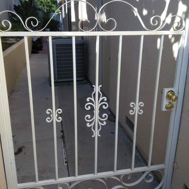 custom iron gate painted white